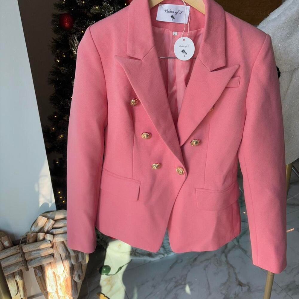 Pink blazer with gold buttons